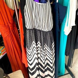 Black and white striped dress. Fits medium. Love the dress. Super comfortable